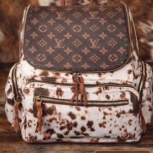 LV1-(PRE ORDER 4/15) Louis Vuitton Monogram Cow Up-Cycled Backpack